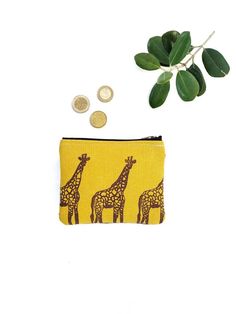 "Coin purse or wallet for cards, bills and coins, with a handmade giraffe print. Women's wallet belonging to the \"The Pond\" collection by Made in Tarrío. 👝 CHARACTERISTICS: This pretty purse or wallet is printed and handcrafted with our own illustration of giraffes, the most elegant in the savana. Handmade printing with ecological inks on mustard cotton canvas. We use brown ink to stamp the giraffes. Each giraffe is made one at a time. The back of the purse is brown, made of smooth fabric with a soft texture. Inside, it has a double pocket to separate cards from folded bills and coins. Main clousure with a gold metal zipper. The lining inside is made of flowers, which contrasts with the dark tones of the wallet (the color of the lining may vary depending on availability). 📏 MEASURES: T Handmade Yellow Wallets For Daily Use, Handmade Yellow Wallet For Daily Use, Yellow Coin Purse With Card Slots As Gift, Yellow Rectangular Coin Purse Gift, Woman Wallet, Octopus Design, Vegan Wallet, Fabric Wallet, Giraffe Print