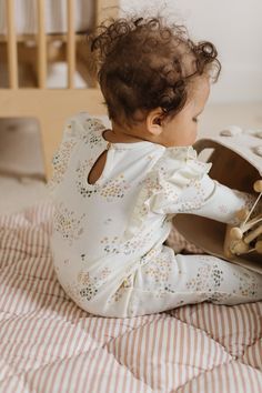 You won't be able to resist that extra squeeze when you see your little one in our oh-so-sweet Flutter Romper. An all-in-one outfit made with certified organic cotton, playful flutter sleeves and a keyhole back bring our perfectly hued prints to life, with snaps at the legs for easy peasy diaper changes. Organic Cotton & Dyes Ethically Made Leg Snaps, Blue Bell Flowers, Cool Baby Clothes, Trendy Baby Clothes, Baby Trend, Cotton Romper, Flower Patch, Ruffle Romper, Clothes Crafts