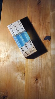 a book sitting on top of a wooden table