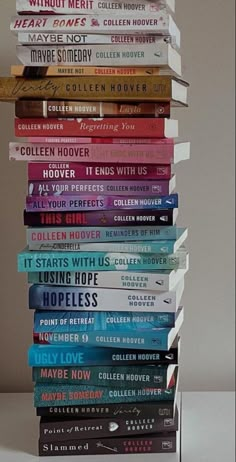 a stack of books sitting on top of each other