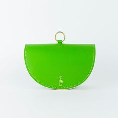 Leather belt bag. Green Leather Belt Bag For Daily Use, Modern Crossbody Saddle Bag With Dust Bag, Green Modern Crossbody Belt Bag, Modern Green Crossbody Belt Bag, Leather Belt Bag With Removable Pouch For Shopping, Chic Green Leather Saddle Bag, Modern Saddle Bag With Dust Bag For Everyday, Green Pouch Flap Bag With Removable Pouch, Green Flap Bag With Removable Pouch