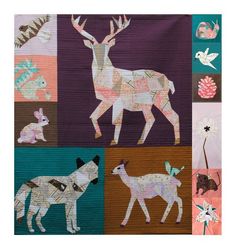 an animal themed quilt hanging on the side of a building with trees in the background