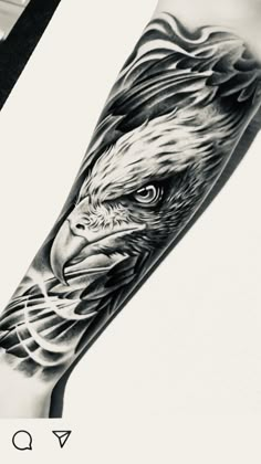 an eagle is shown on the arm with black and white inks, as well as some