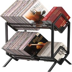 three tiered rack with cd's and cds