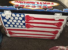 an american flag cooler sitting on the floor