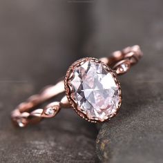 a close up of a ring on a rock