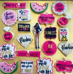 decorated cookies are displayed on a table with pink and white icing, including one woman's name