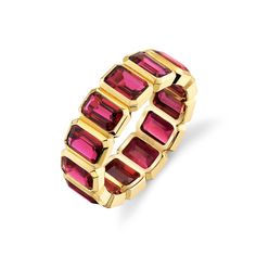 Introducing the 13 Ruby 18k Yellow Gold Eternity Band - a breathtaking piece of fine jewelry that exudes elegance and style. The band features 13 radiant rubies, each cut in an emerald shape and set in a bezel setting. The total carat weight of the rubies is 7.780, making this a truly striking piece. The band is crafted from 18k yellow gold, ensuring that it is strong, long-lasting, and of the highest quality. Luxury Ruby Jewelry Radiant Cut, Luxury Radiant Cut Ruby Ring, Luxury Radiant Cut Ruby Jewelry, Luxury Ruby Baguette Cut Jewelry, Luxury Emerald Cut Ruby Jewelry, Luxury Emerald Cut Lab-created Ruby Jewelry, Luxury Emerald-cut Lab-created Ruby Jewelry, Luxury Lab-created Emerald Cut Ruby Jewelry, Luxury Ruby Jewelry With Rectangular Shape