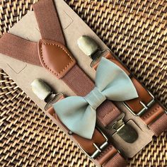 Sage Bow Tie & Brown Suspenders are PERFECT for a sage green wedding, bowtie, ring bearer outfit, boho wedding, bow ties for men or any other special occasion!X-Small: 6 months- 2 yearsSmall: 3 years- 5 yearsMedium: 6 years- 12 yearsAdult: 13 years- Up To 6ft tallBig & Tall: Adults Over 6ft Tall//SHIPPING//VERY IMPORTANT: Time to make and ship your order can be found under the shipping information with each item. :)**FIRST CLASS MAIL (default) takes 2-5 business days to arrive AFTER your package is shipped.**PRIORITY MAIL takes 1-3 business days to arrive AFTER the items are shipped.//Important// Business Days are Monday-Friday//International Orders// Please understand that International Orders that select "USPS International Shipping" takes 4-6 weeks and customs need to be factored in her Classic Wedding Belts And Suspenders With Bow Tie, Elegant Adjustable Belts And Suspenders For Wedding, Dapper Suspenders For Wedding, Dapper Wedding Suspenders, Adjustable Dapper Belts And Suspenders For Party, Adjustable Bow Tie For Groom, Summer, Dapper Adjustable Bow Tie For Weddings, Classic Brown Belts And Suspenders For Wedding, Adjustable Summer Bow Tie For Groom