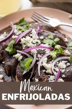 a plate with meat, onions and cilantro on it