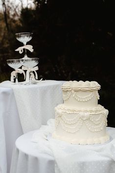 a wedding cake sitting on top of a table