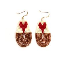 two tone beaded earrings with red and white heart shaped beads on each earring