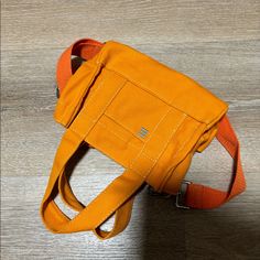 Urban Outfitters Orange Canvas Mini Tote Bag Brand New Cotton Canvas Bag, Never Use Summer Statement Piece Tan Canvas Bags With Adjustable Strap, Orange Canvas Shoulder Bag For Everyday Use, Orange Everyday Canvas Shoulder Bag, Everyday Orange Bags With Pockets, Urban Outfitters Travel Bags For Summer, Urban Outfitters Summer Travel Bags, Orange Bags With Pockets For Daily Use, Orange Bag With Pockets For Daily Use, Casual Orange Satchel With Double Handle