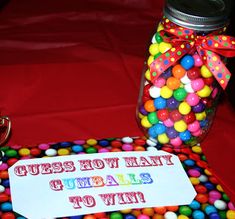 an image of a table with candy in a jar