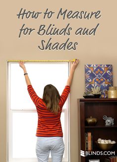 a woman measuring the width of a window with text overlay reading how to measure for blinds and shades