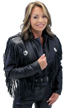 Women's fringe leather jacket made of heavy weight top grain buffalo leather. This cropped leather jacket is also a great black leather motorcycle jacket. A black leather jacket for women that comes with 8" leather fringe on front, back and sleeves. Also comes with decorative conchos on front and back, 2 front pockets, inside chest pocket, zippered cuffs to keep the wind out, zip out lining for cooler weather, and a removable full belt. An exclusive Jamin Leather® Brand. (CUSTOM BEADING AVAILABLE: Call 843-294-1222 for custom bead options. $45 for tri-color beading of your choice front and back as shown in photo. Sizes may run small: XS, S, M, L, XL, 2X. +$10 for 2X. [6#] zip out lining zip cuffs YKK quality zippers 8" leather fringe front pockets decorative conchos inside chest pocket rem Black Western Leather Jacket For Winter, Western Style Black Leather Jacket For Winter, Fall Biker Leather Jacket With Fringe, Winter Biker Outerwear With Fringe, Biker Style Fringe Outerwear For Fall, Black Leather Outerwear With Fringe, Black Leather Fringe Outerwear, Fitted Leather Jacket With Fringe, Black Leather Jacket With Fringe For Winter