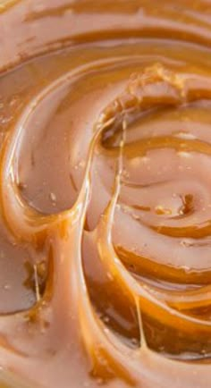 peanut butter swirls are being swirled into chocolate