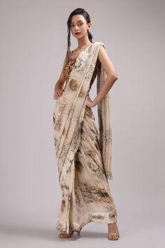 Off-white, gold pre-pleated saree with abstract print. Paired with square neck strappy blouse. - Aza Fashions Elegant Blouse Piece With Traditional Drape And Printed Motifs, Traditional Pre-draped Saree For Reception With Printed Motifs, Elegant Pre-draped Georgette Saree With Printed Motifs, Fitted Pre-draped Saree With Printed Motifs, Fitted Pre-draped Saree With Printed Motifs For Reception, Fitted Silk Pre-draped Saree With Printed Motifs, Elegant Fitted Pre-draped Saree With Printed Motifs, Fitted Pre-draped Saree With Printed Motifs In Georgette, Fitted Pre-draped Georgette Saree With Printed Motifs