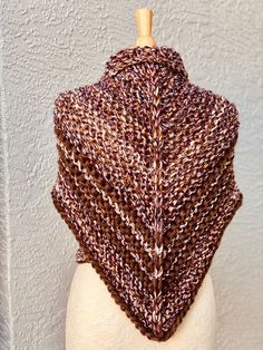 The shawl is made from a 40% merino wool and 60% acrylic yarn. The wing span is approximately: XS-S - 64-66 inches, M-L - 72-74 inches, XL-1x - 80-82 inches. The knitted fabric is flexible and stretchy. CARE: Wash in cold water, gentle cycle, lay flat to dry. All items are made from a high quality yarn in a pet and smoke free home studio. Knit Play Love is a one-woman operation. I design, create, take pictures, package, and ship every item in my shop. I also try to respond to all your emails and Brown Crochet Shawl For Fall, Fall Crochet Brown Shawl, Knit Acrylic Yarn Scarves, One Size Hand Knitted Brown Knitting Pattern, Brown Knitted Shawl For Fall, Brown Hand Knitted One Size Knitting Pattern, One Size Brown Hand Knitted Pattern, Knitted Shawl For Fall, Knitting Pattern For Yarn Shawl