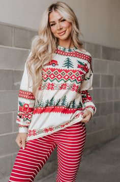 Tan base with red & green holiday designStretch: triple stretch // TTS for an oversized lookMaterial: 95% cotton, 5% spandex ***not a true color match with Ampersand Avenue Peppermint Stripe Joggers***