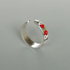 A sterling silver toe ring enameled with a red and white yin yang design. 5mm wide. This is an open ended toe ring and can be adjusted to fit most feet. These toe rings are made of 925 hypoallergenic sterling silver. Please note this price is for ONE toe ring only. Sent in a gift box. I can include a personal message from you if needed You are welcome to contact me at... bhavnakwintra1956@gmail.com For more beautiful pieces from my shop, please browse 👇 TOE RINGS: https://www.etsy.com/your/shop Adjustable White Toe Rings As Gift, Adjustable White Toe Rings For Gift, White Sterling Silver Toe Rings For Gift, White Sterling Silver Toe Rings As Gift, Sterling Silver White Toe Rings As Gift, Yin Yang Designs, Sterling Silver Toe Rings, Silver Toe Rings, Jewelry Minimalist