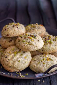 a plate filled with cookies on top of a wooden table