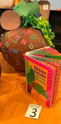 a table topped with lots of books and decorations