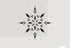 a black and white snowflake is shown on a gray background with the words, winter