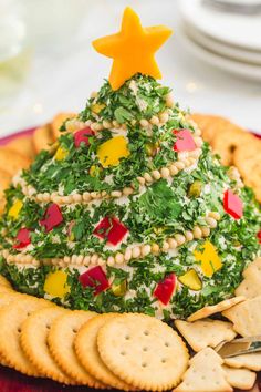 a christmas tree made out of crackers on a plate