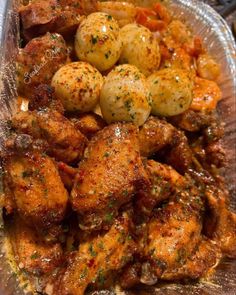 chicken with potatoes and carrots in a plastic container