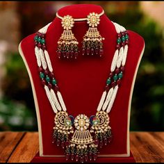 New Never Used .Moving Sale . You Will Get What You See In The Pictures. Very Beautiful Kundan And Beads And Beautiful Peacock Design On Necklace. Necklace And Earrings.Adjustable String On The Back Of Necklace.Last Picture Is Inside Out . Necklace Is With Kundan Jadau Work With Layers Of High Quality Rajwadi Stones And Beads . Red And White Beads Are Natural Beads. Matching Earrings Too.Bought Extra For Wedding As Gift. Tag-Saree Lehenga Formal Anarkali Authentic Boho White Wedding Jewelry With Peacock Design, Festive Long Beaded Kundan Necklace, Festive Red Jeweled Kundan Necklace, Festive Red Bohemian Kundan Necklace, Festive Dual-tone Kundan Necklace, Festive Red Gold-plated Kundan Necklace, Pakistani Wedding Jewelry, Wedding Jewelry Necklace, Saree Lehenga