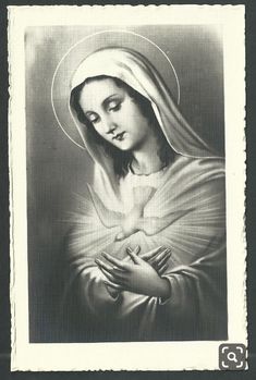 an old photo of the virgin mary with her hands folded in front of her chest