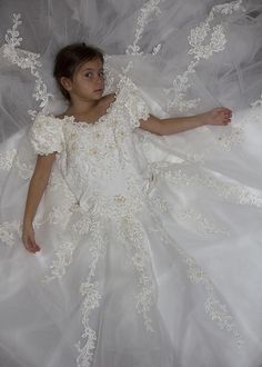 Capture your little girl in her mom's wedding dress, then share it on her big day! Sibling Pics, Dress Pics, S Wedding Dress, Wedding Dress Photoshoot, Mommy Daughter Photos, Wedding Fotos, Mom Wedding Dress, Wedding Dress Photography, Renewal Wedding