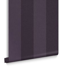 a purple wallpaper with vertical stripes on it