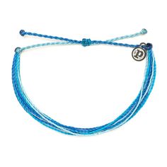 It’s the bracelet that started it all. Each one is handmade, waterproof and totally unique—in fact, the more you wear it, the cooler it looks. Grab yours today to feel the Pura Vida vibes. - 100% Waterproof- Wax-Coated- Iron-Coated Copper "P" Charm- Adjustable from 2-5 Inches in Diameter Sage Birthday, Dream Wishlist, String Bracelets, Fish Jewelry, Pinterest Ideas, School Clothes, Pretty Jewelry