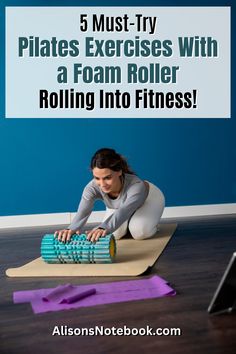 a woman is laying on the floor while doing exercises with foam rollers in front of her