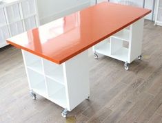 an orange and white desk in a room