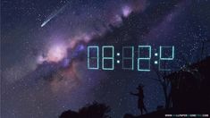 the time clock is displayed in front of an image of the night sky and stars