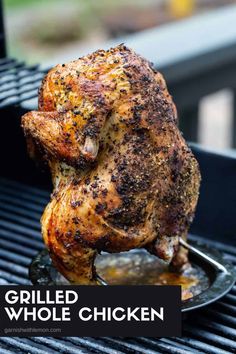 a roasted chicken on a grill with oil