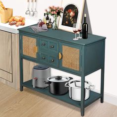 an image of a kitchen with pots and pans on the sideboard next to it