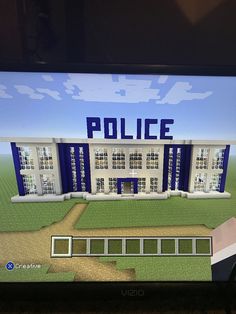 a computer screen showing a police station on it's display area with the words police written in blue