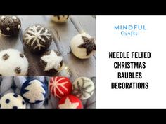 needle felted christmas baubles are decorated with snowflakes and starbursts