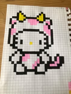 an image of a hello kitty made out of legos on a piece of paper