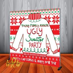 an ugly sweater party greeting card on a wooden floor with wood planks in the background