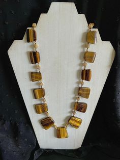 Tiger's eye chunky necklace with 3 inch extender and lobster clasp. Made in a home with dogs. Adjustable Rectangular Necklace With Lobster Clasp, Tiger Eye Necklace, Mount Airy, Hand Knotted Necklace, Tigers Eye Necklace, Blue Tigers Eye, Carnelian Beads, Evil Eye Necklace, Crazy Lace Agate