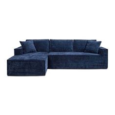 a blue sectional couch with pillows on it's back and the seat folded out