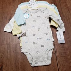 Nwt Brand Carter's Size 3m 4pc Long Sleeve Onsie Set 1. Animal Themed 2. Yellow Striped 3. Multi Color Hello 4. Blue Striped Stretchy Soft Cotton Check Out My Closet For More Baby Items Bundle To Save Pet And Smoke Free Home Yellow Cotton Bodysuit For Playtime, Yellow Long Sleeve Cotton Onesie, Yellow Long Sleeve Casual Onesie, Casual Yellow Long Sleeve Bodysuit, Carters Baby Clothes, Thermal Hoodie, Carter Kids, Sequin Shirt, Happy Pride