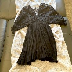 Free People Women’s Dress Size S/P Mwt Black Mini Dress For Beach Cover-up, Black V-neck Summer Mini Dress, Black Mini Dress With V-neck For Vacation, Black Mini Dress V-neck For Vacation, Black Flowy V-neck Mini Dress, Bohemian Black Mini Dress For Brunch, Black Flowy Summer Dress, Black Mini Dress For Summer Beach Cover-up, Black Flowy Mini Dress For Summer