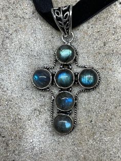 Brilliant antique Rainbow Labradorite cross Lovely handmade silver work Silver About an inch and a half long All jewelry is shipped in a nice gift box. Check out our over a THOUSAND great reviews Spiritual 925 Stamped Jewelry For Memorials, Silver Cross Necklace Gift, Silver Cross Necklace For Gift, Spiritual Cross Pendant Necklace For Jewelry Making, Oxidized Spiritual Cross Necklace, Artisan Cross Jewelry For Jewelry Making, Distinctive Cross Jewelry For Gifts, Gemstone Pendant Cross Necklace For Gift, Handmade Spiritual Cross Pendant Jewelry