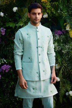 Aqua blue cotton silk quilted waistcoat with floral hand block print. Comes with trouser and a kurta. - Aza Fashions Cotton Nehru Jacket For Spring Wedding, Transitional Cotton Nehru Jacket With Printed Motifs, Resham Embroidered Cotton Nehru Jacket, Fitted Traditional Nehru Jacket With Floral Print, Blue Embroidered Cotton Nehru Jacket, Traditional Floral Print Nehru Jacket, Waistcoat Pattern, Eid Party, Silk Quilt